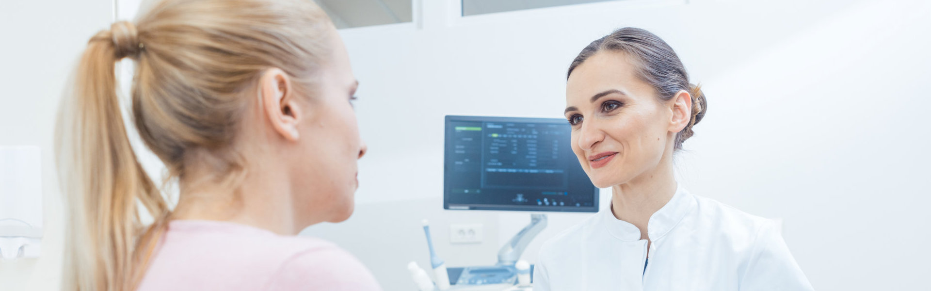 doctor talking to her patient
